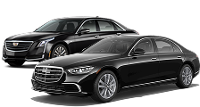 A black Mercedes-Benz S-Class and a black Cadillac escalade CT6.